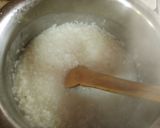 A picture of step 1 of Punjabi kesari kheer (yellow rice pudding).