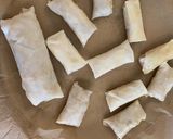 A picture of step 10 of Thai minced pork spring rolls.