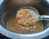 A picture of step 2 of Paruppu payasam / moong dal kheer.