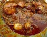 A picture of step 4 of Stuffed onion masala.