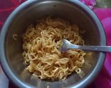 A picture of step 5 of Schezwan noodles .