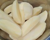 A picture of step 1 of Potato Masala Wedges.