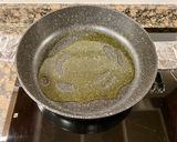 Foto del paso 3 de la receta: “ Arroz meloso” con anillas de pota