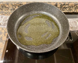 Foto del paso 3 de la receta: “ Arroz meloso” con anillas de pota