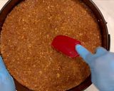 A picture of step 4 of Pumpkin cheesecake with gingersnap pecan crust.