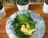 A picture of step 2 of Mango Mojito 🥭🍋🧊🌿🍋🥭.