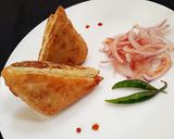 A picture of step 25 of Kolkata style Mughlai Paratha.