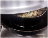 A picture of step 7 of Rava Tutti-fruiti Cake.