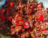 A picture of step 4 of Red chilli pickle.