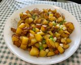 Une image de l'étape 10 de Pommes de terre sautées aux oignons nouveaux.
