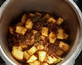 A picture of step 3 of Potato Masala Curry.