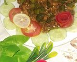 A picture of step 9 of Bhindi chicken.