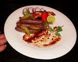 A picture of step 28 of Alexandrian Sausage.
