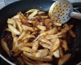 A picture of step 10 of Chilli Potato.