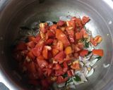 A picture of step 2 of Tomato coconut rice.