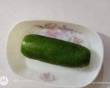 A picture of step 1 of Masala chaach (Peeled cucumber and peanut).