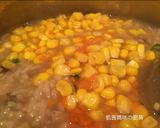A picture of step 8 of Chicken, Corn, and Mushroom Congee.