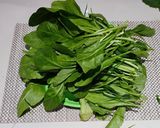 A picture of step 1 of Sarso Ka Saag (sarso, palak, bathua).