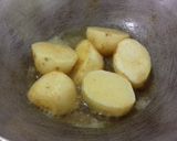 A picture of step 1 of Bengali Style Murgir Patla Jhol.