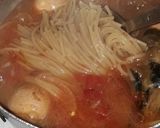 A picture of step 3 of Spageti jollof.