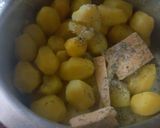 A picture of step 3 of Cheese & Oregano mash potatoes.Local food contest Nairobi_ North.