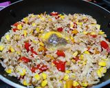 A picture of step 7 of Thai style fried rice with vegetables and tofu.