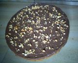 A picture of step 17 of Banana nut cake with chocolate frosting.