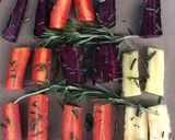 A picture of step 4 of Rosemary roasted carrots.
