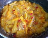 A picture of step 2 of Hot and Sweet Garlic Mango Slice.