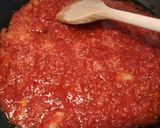 A picture of step 2 of Langostines in a spicy tomato and prosecco sauce.