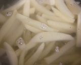 A picture of step 1 of Garlic fries /crispy potatoes 😋.