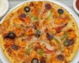 A picture of step 6 of Tandoori Chicken pizza.