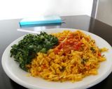 A picture of step 11 of Coconut Fried Rice with butter-steamed veggies.