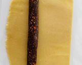 A picture of step 10 of Almond and date roll.