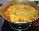 A picture of step 3 of Kaju Chicken Curry.