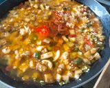 A picture of step 7 of Paella with Cuttlefish and Seasonal Vegetables.