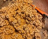 A picture of step 2 of Peanut butter Cheerio bars.