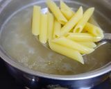 A picture of step 1 of Cheesy and Creamy veggie white sauce penne pasta (with fresh cream, cheese and seasonings).
