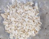 A picture of step 1 of Kadali Manja Rai (Banana stem curry in mustard paste).