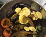 A picture of step 5 of Baingan potato and tomato kalonji.