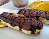 A picture of step 14 of Choco orange eclair with fresh cream...cup of hot chocolate.