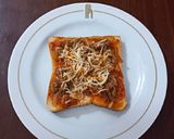 Foto langkah ke 11 dari resep Pizza Roti Bakar Topping Beef Slice Bolognese.
