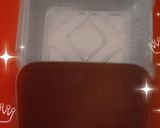 A picture of step 4 of Ty cakes, nice red coloured cake with foil tin.