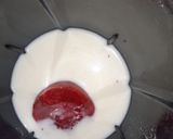 A picture of step 2 of White choco strawberry shake.