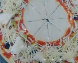 صورة لخطوة 7 من وصفة بيتزا 🍕 بعجينة سحرية 😋 وشكل رائع 👍❤️
