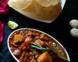A picture of step 17 of Bengali Luchi, aloo'r dom.