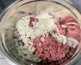 Une image de l'étape 5 de Courgettes et poivrons farcis bœuf, tomates et oignon.