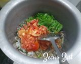 A picture of step 1 of Vegetable and Leafy Greens Khichdi.