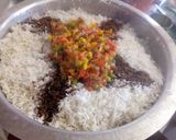 A picture of step 4 of Chinese Stir fried Rice with stewed drumsticks.