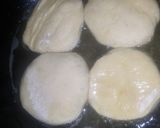 A picture of step 6 of Vanilla cream filled doughnuts.